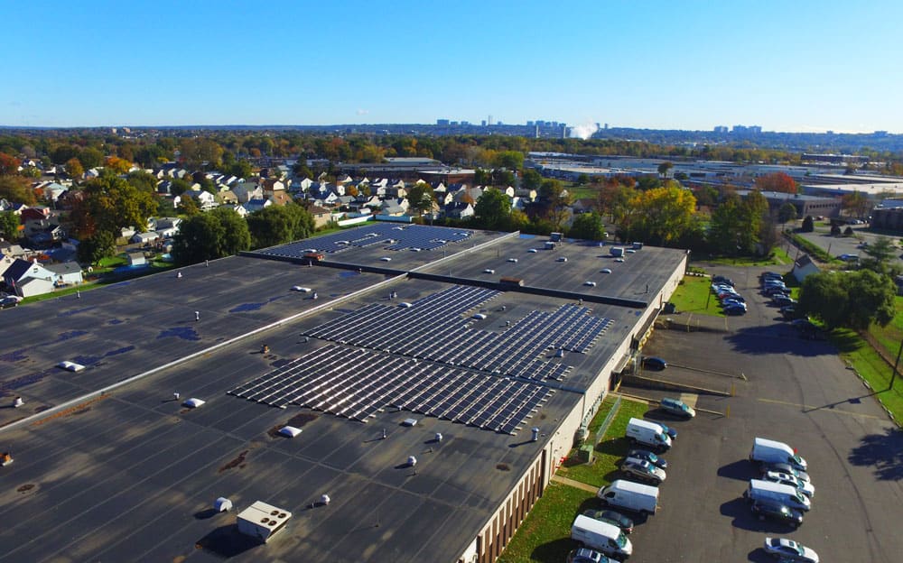 The 287.106kW commercial solar installation at Avanti Linens generates 390,564kWh annually.